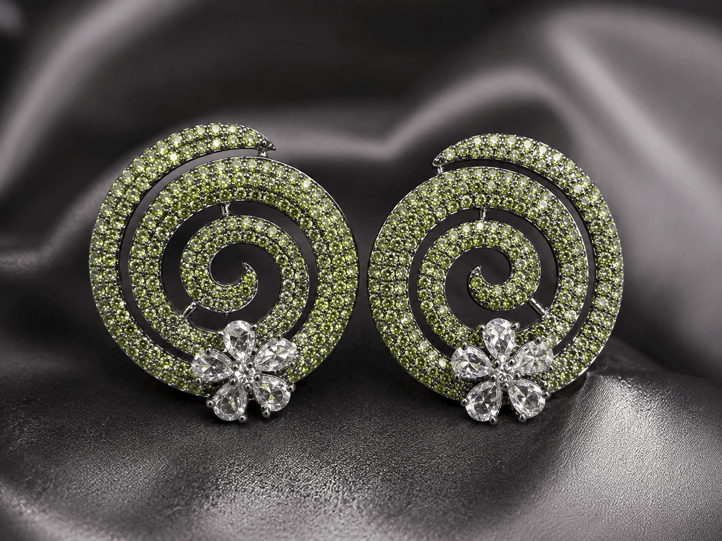 AD studs with yellow stones