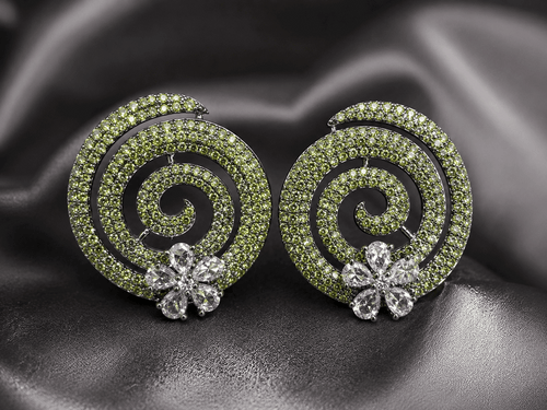 AD studs with yellow stones