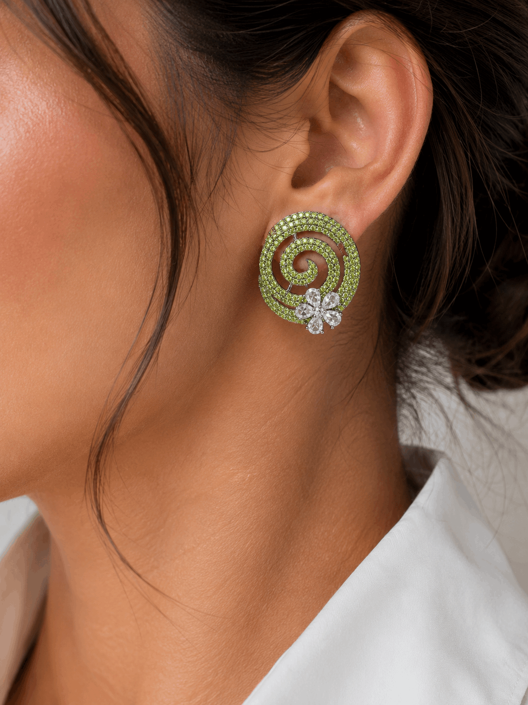 AD studs with yellow stones