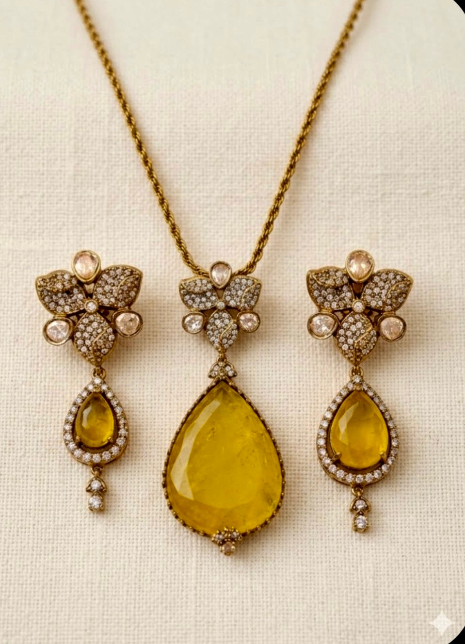 Yellow stone pendant set